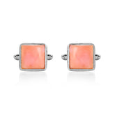 Pair of square pink cufflinks with silver borders on a white background