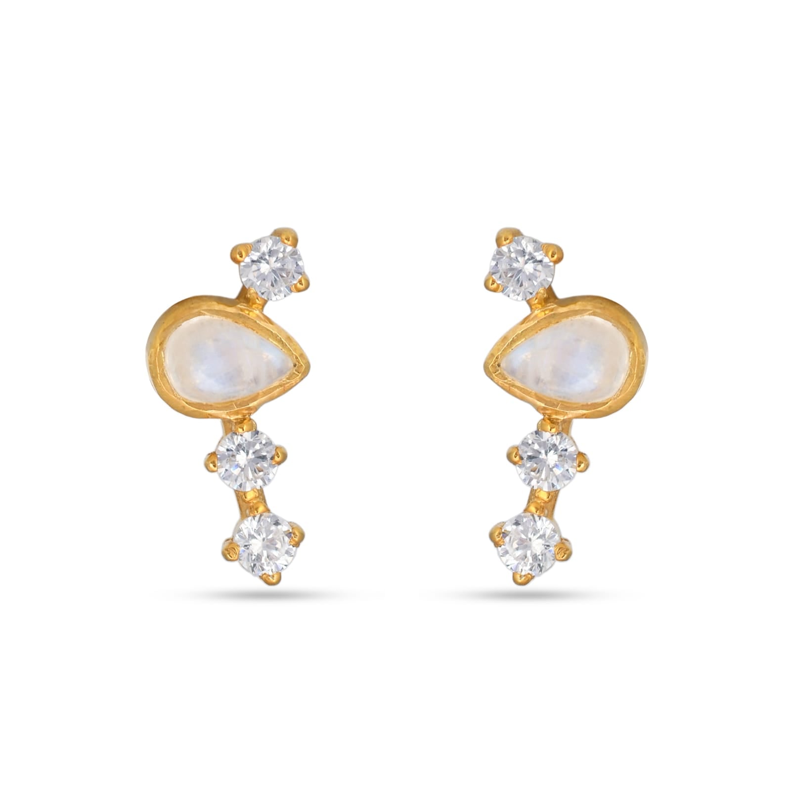 Gold earrings with clear gemstones on a white background