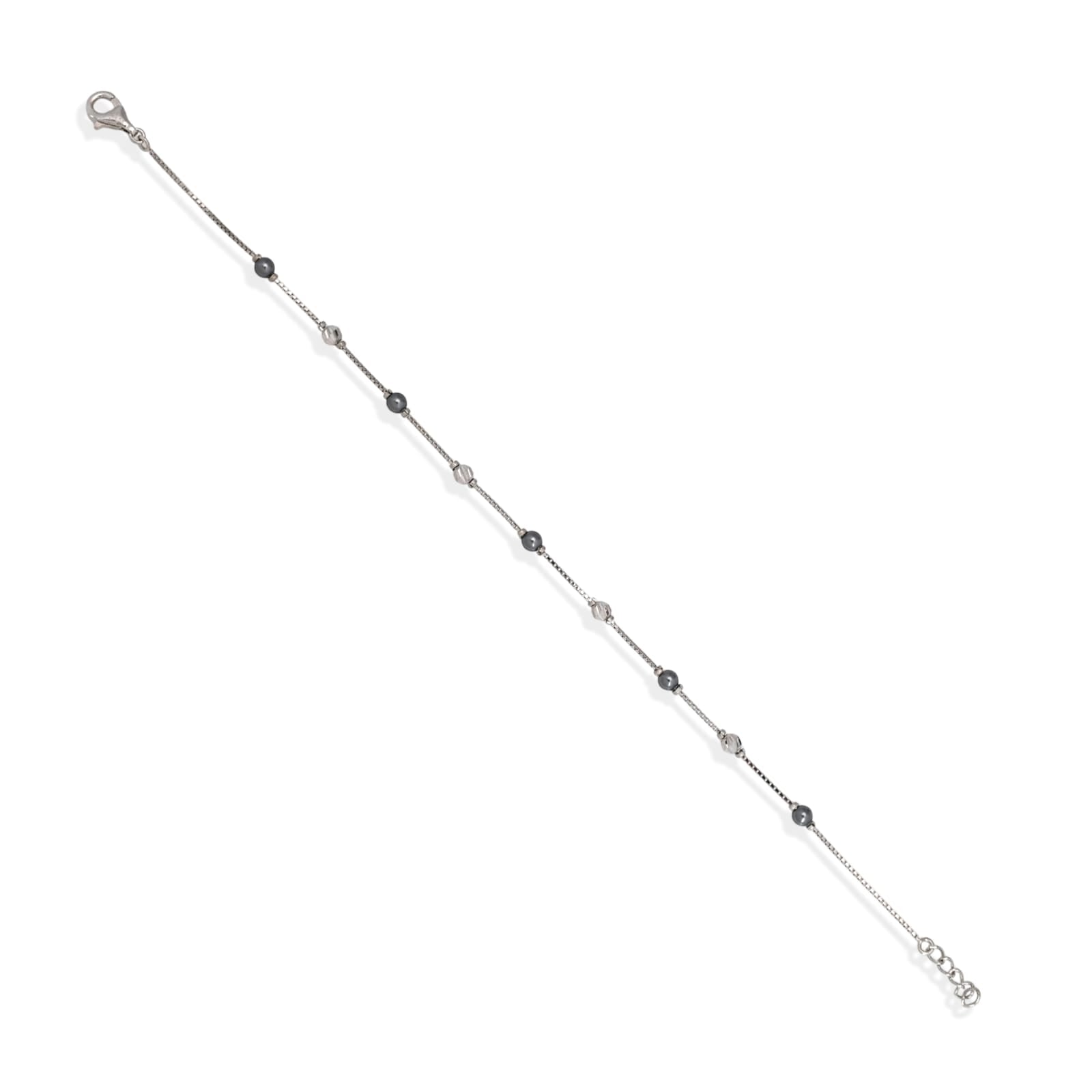 Silver bracelet with small beads on a white background