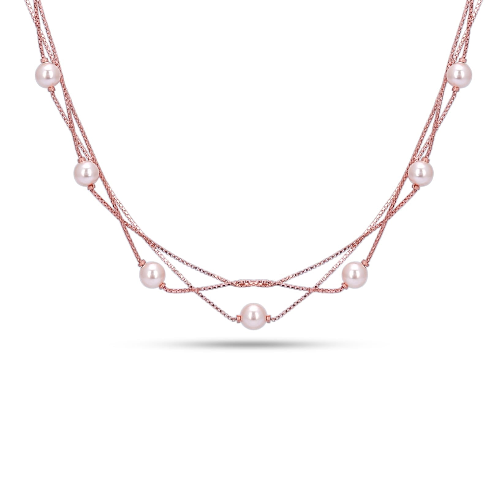 Multi-strand necklace with pearls on a white background