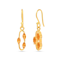 Gold earrings with orange gemstones on a white background