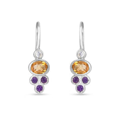 Silver earrings with orange and purple gemstones on a white background