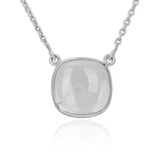 Silver necklace with a clear stone pendant on a white background