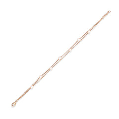 Rose gold bracelet with small diamonds on a white background