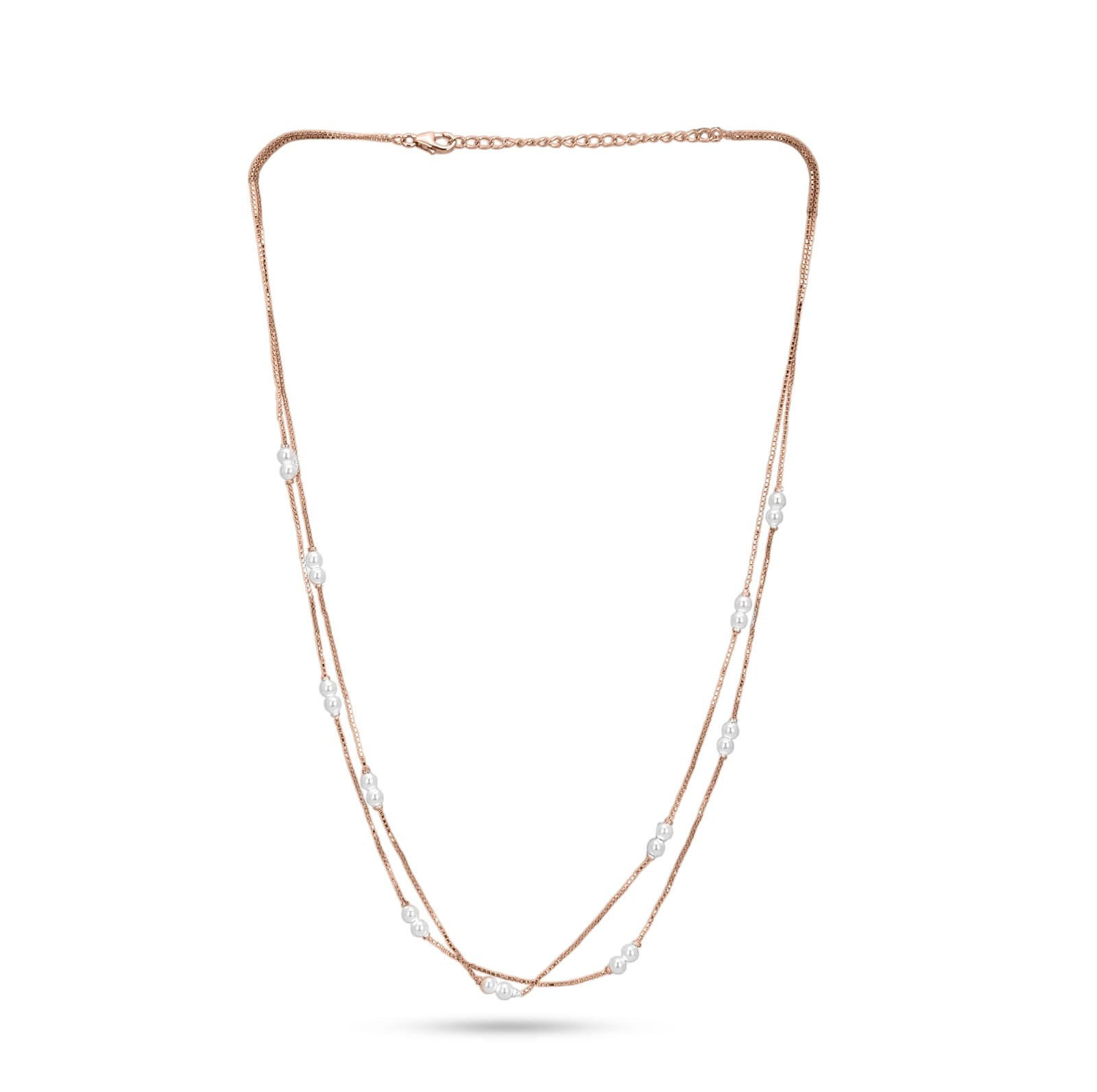 Long necklace with rose gold chain and pearls on a white background