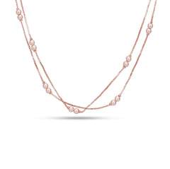 Two-layered pearl necklace on a white background