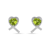Heart-shaped green gemstone earrings on a white background