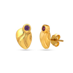 Gold earrings with purple gemstones on a white background