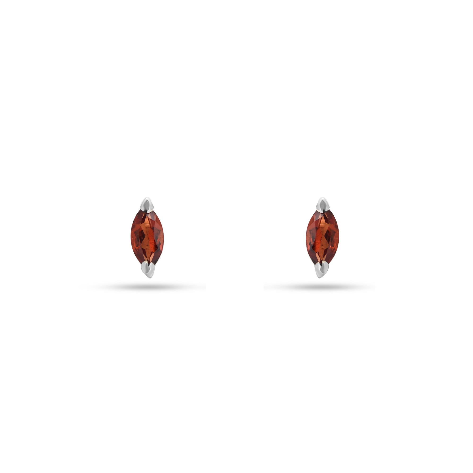 Pair of marquise-shaped amber earrings on a white background