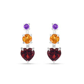 Pair of earrings with heart-shaped gemstones on a white background