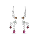 Silver earrings with gemstones on a white background