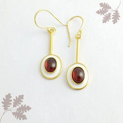 Oval garnet silver earrings