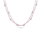 Necklace with pearls on a white background