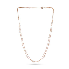 Long necklace with pearls on a white background