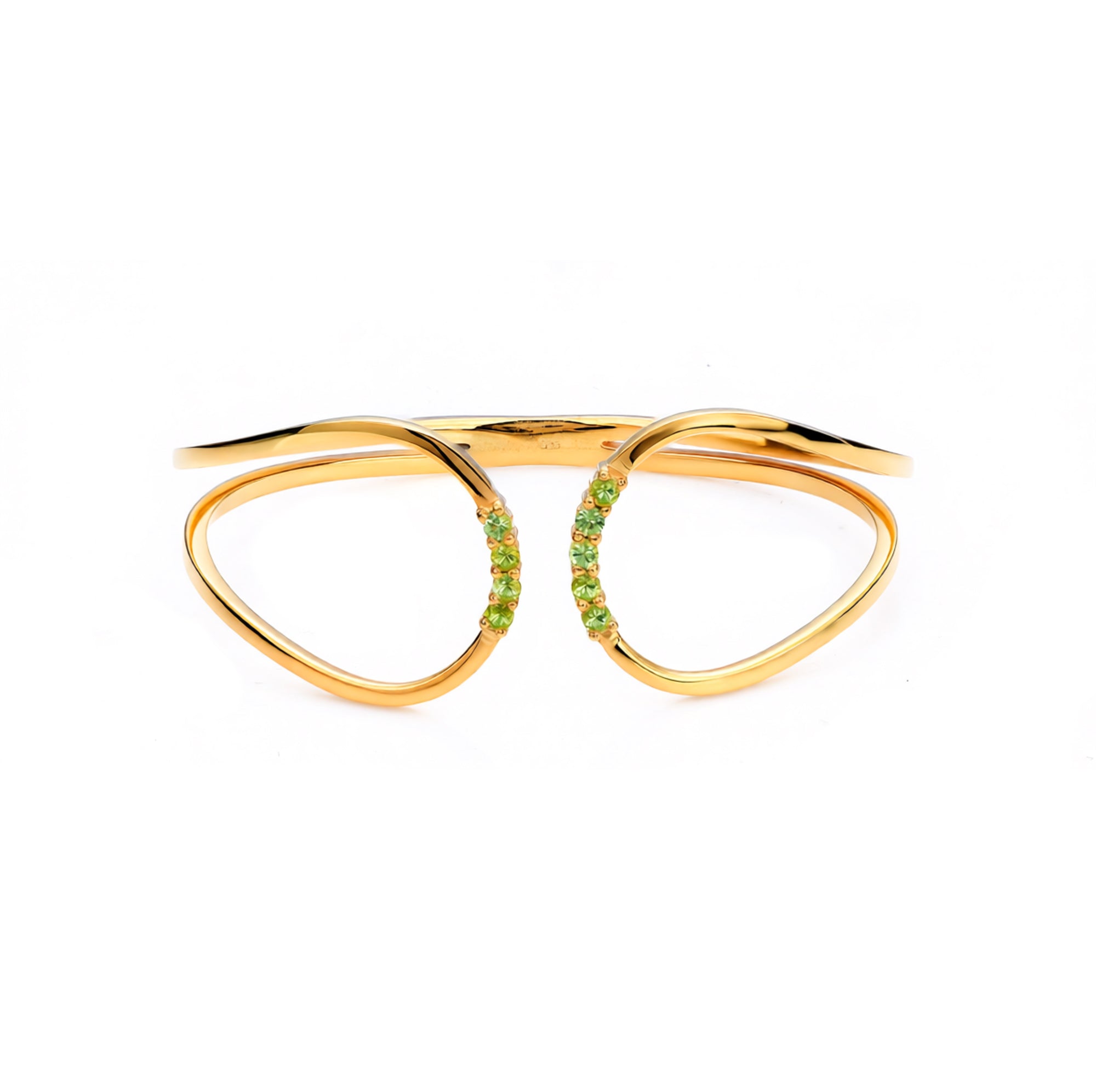 Gold bracelet with green gemstones on a white background
