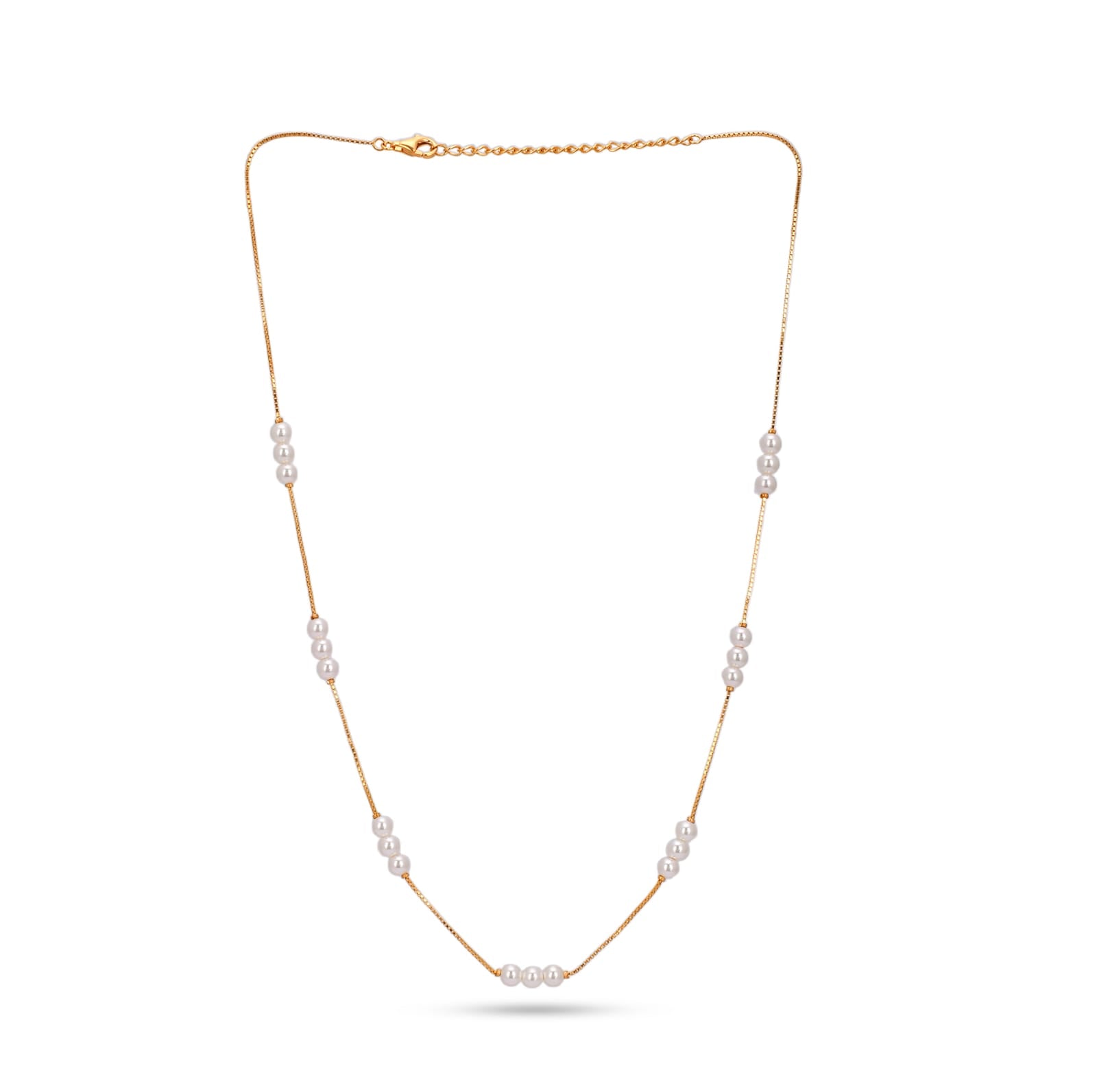 Gold necklace with pearls on a white background