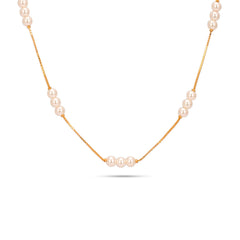 Pearl necklace with gold chain on a white background