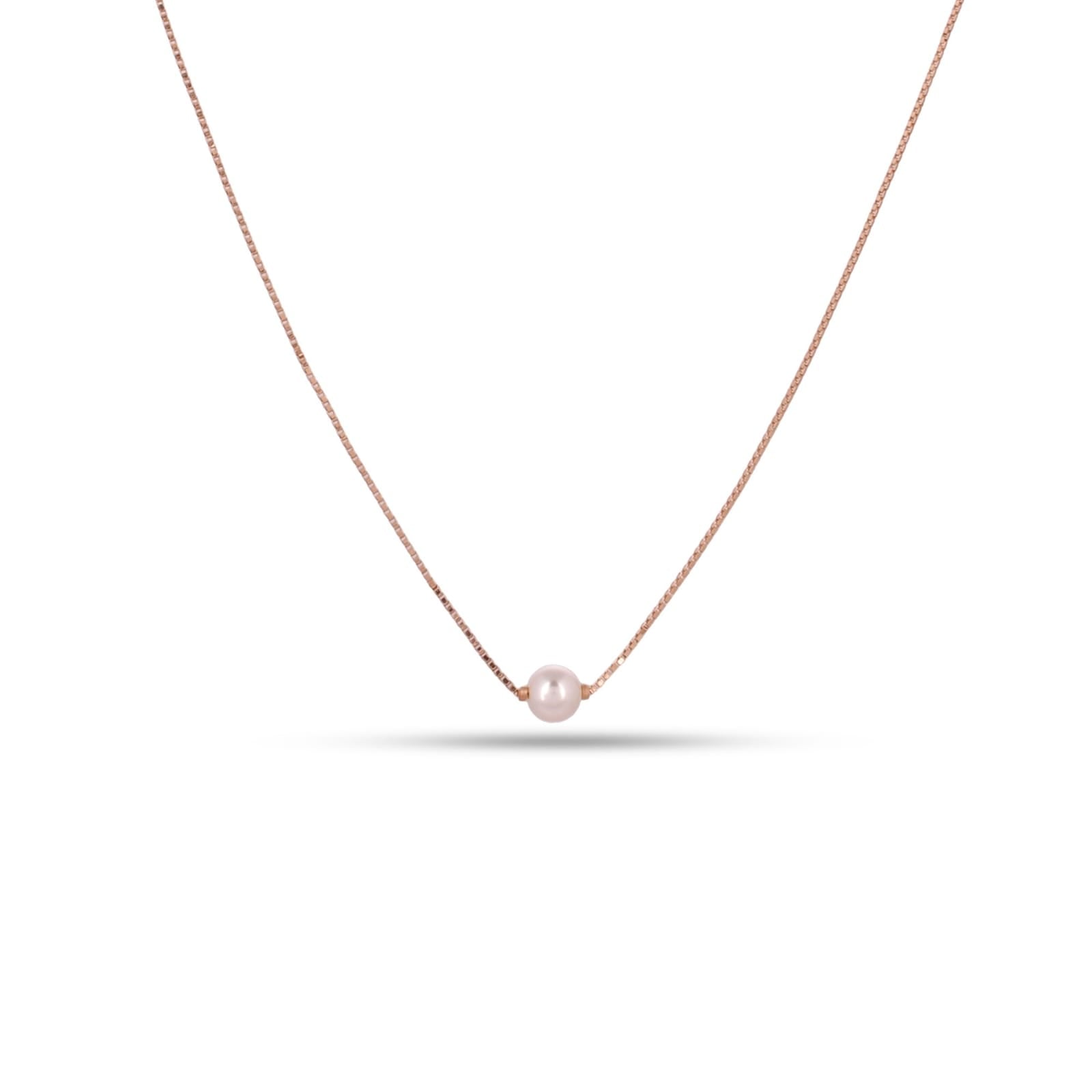Necklace with a single pearl on a white background