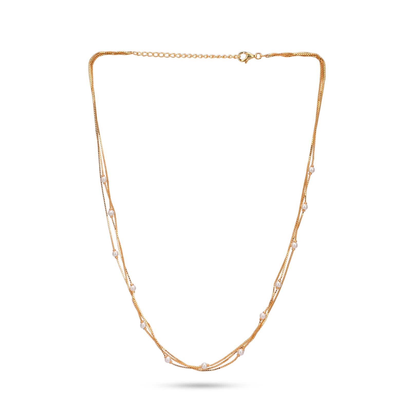 Gold necklace with small pearls on a white background