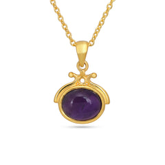 Gold necklace with a purple gemstone pendant on a white background