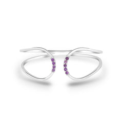 Silver bracelet with purple gemstones on a white background