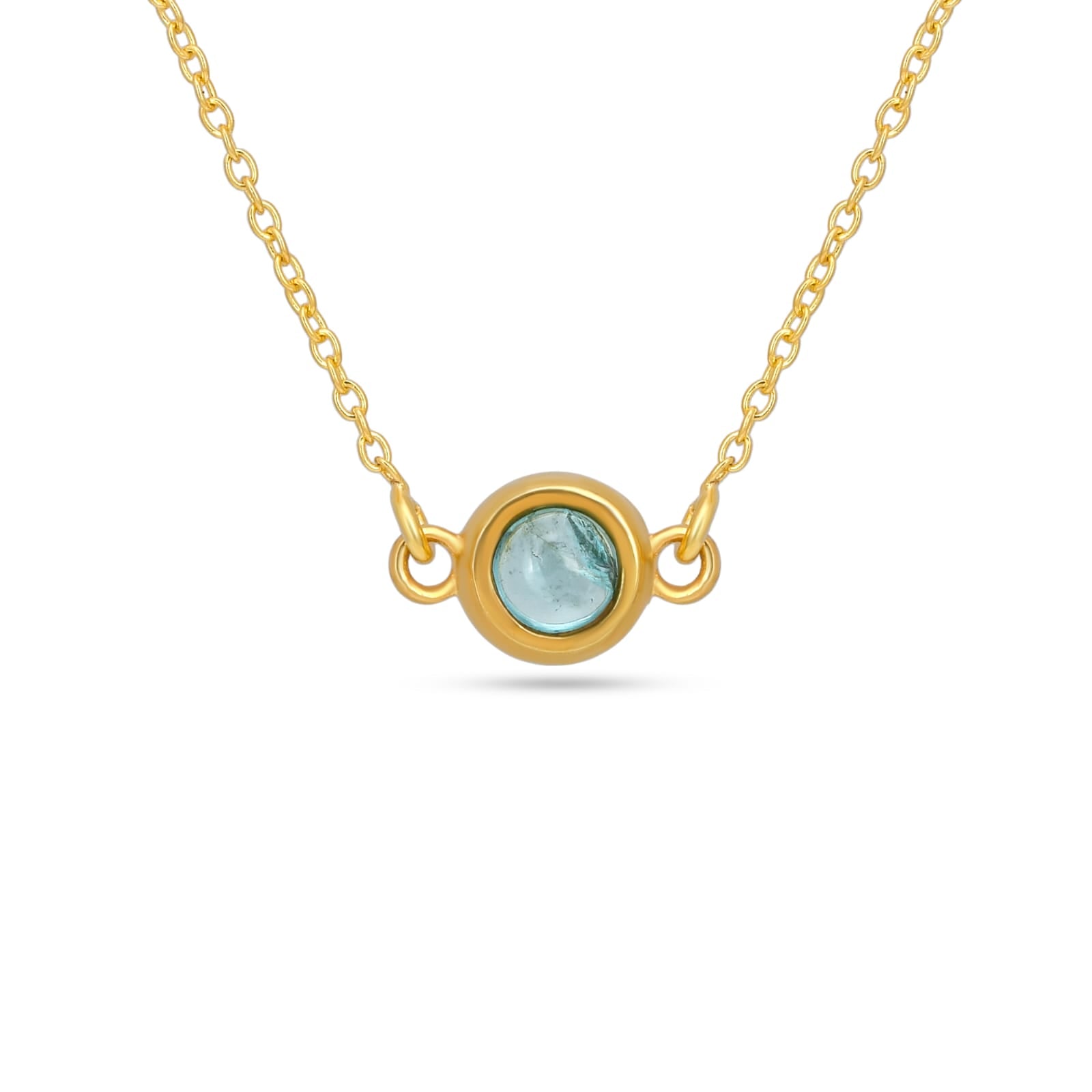 Gold necklace with a round gemstone pendant on a white background
