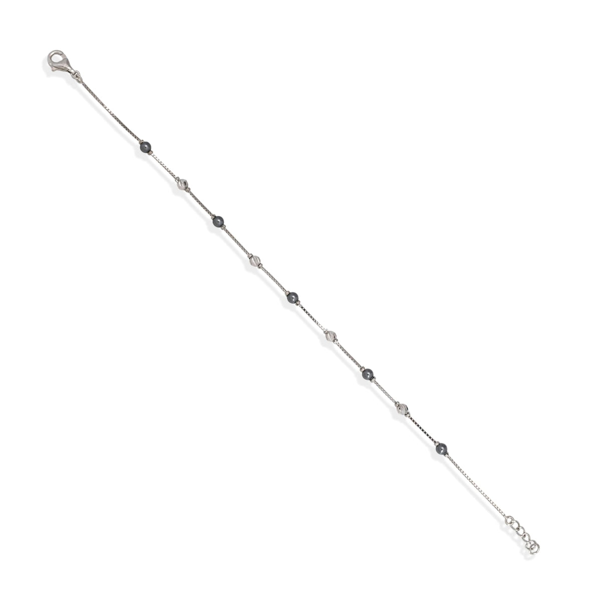 Silver bracelet with small beads on a white background