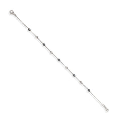 Silver bracelet with small beads on a white background