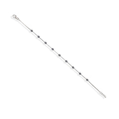 Silver beaded necklace on a white background