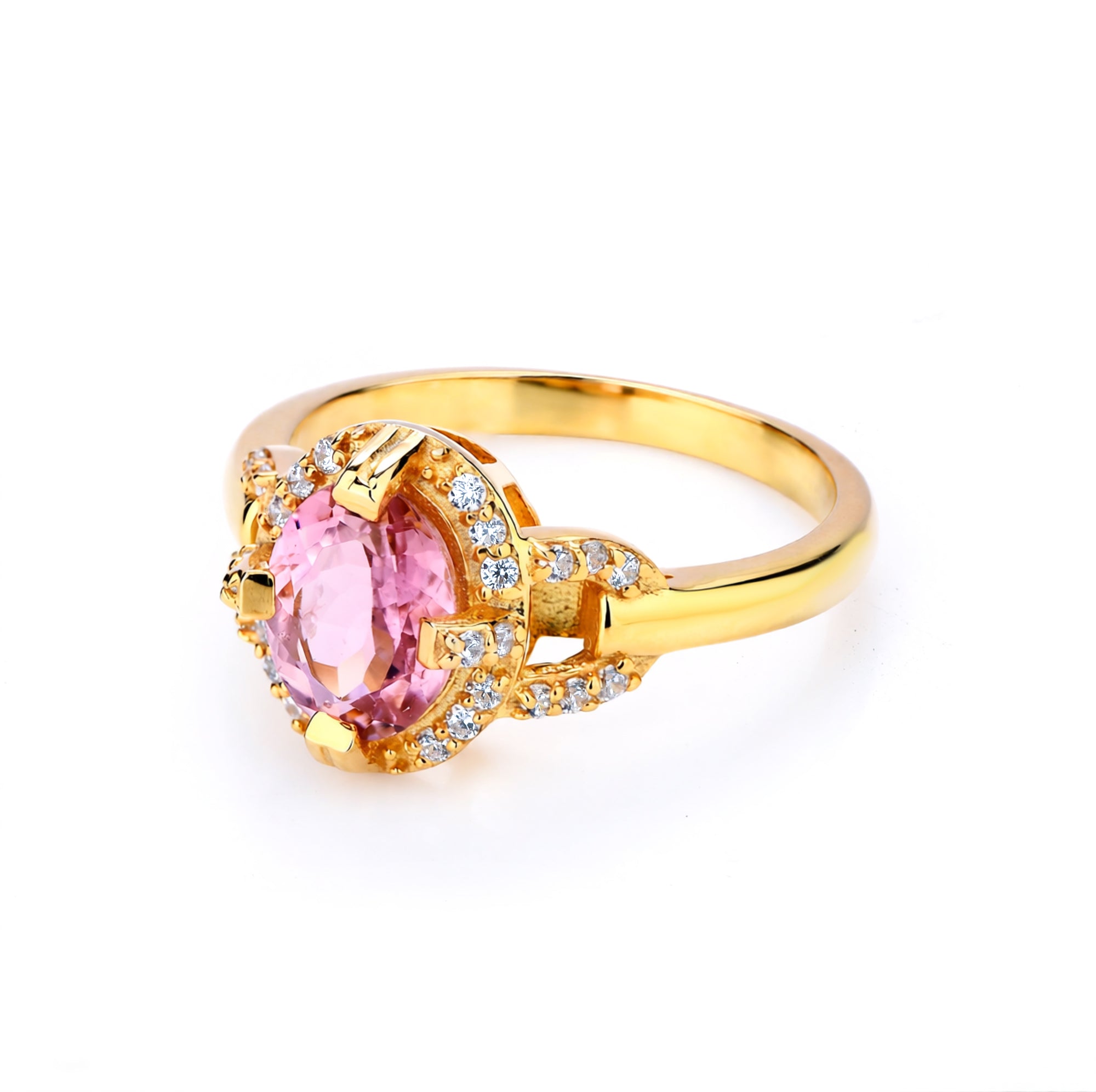 Gold ring with a pink gemstone on a white background