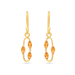 Gold earrings with orange gemstones on a white background