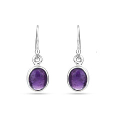 Silver earrings with purple gemstones on a white background