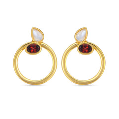 Gold hoop earrings with red gemstones and white stones on a white background