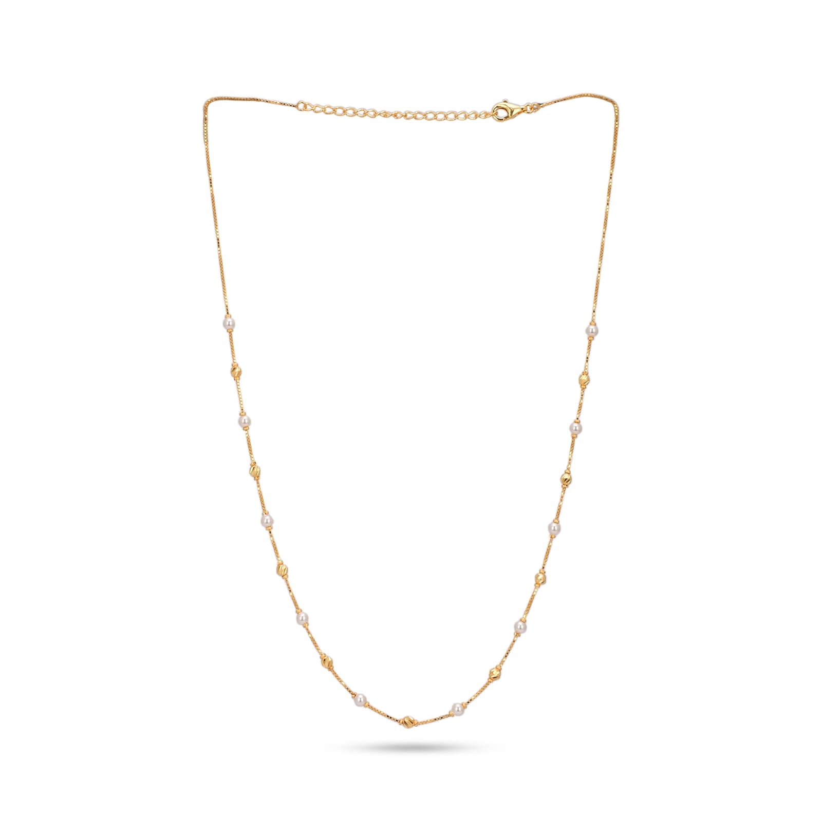 Gold necklace with small pearls on a white background