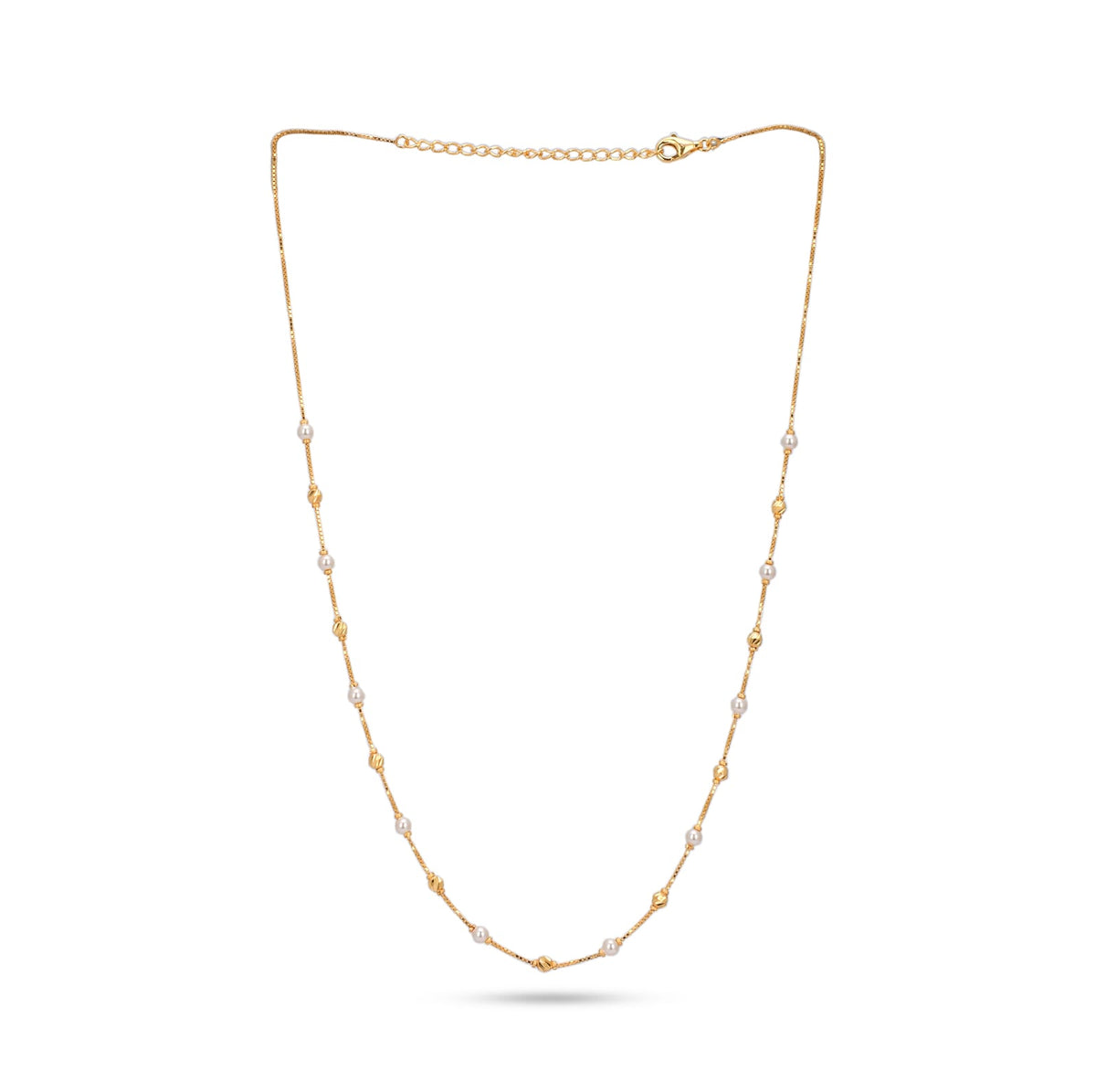 Gold necklace with small pearls on a white background