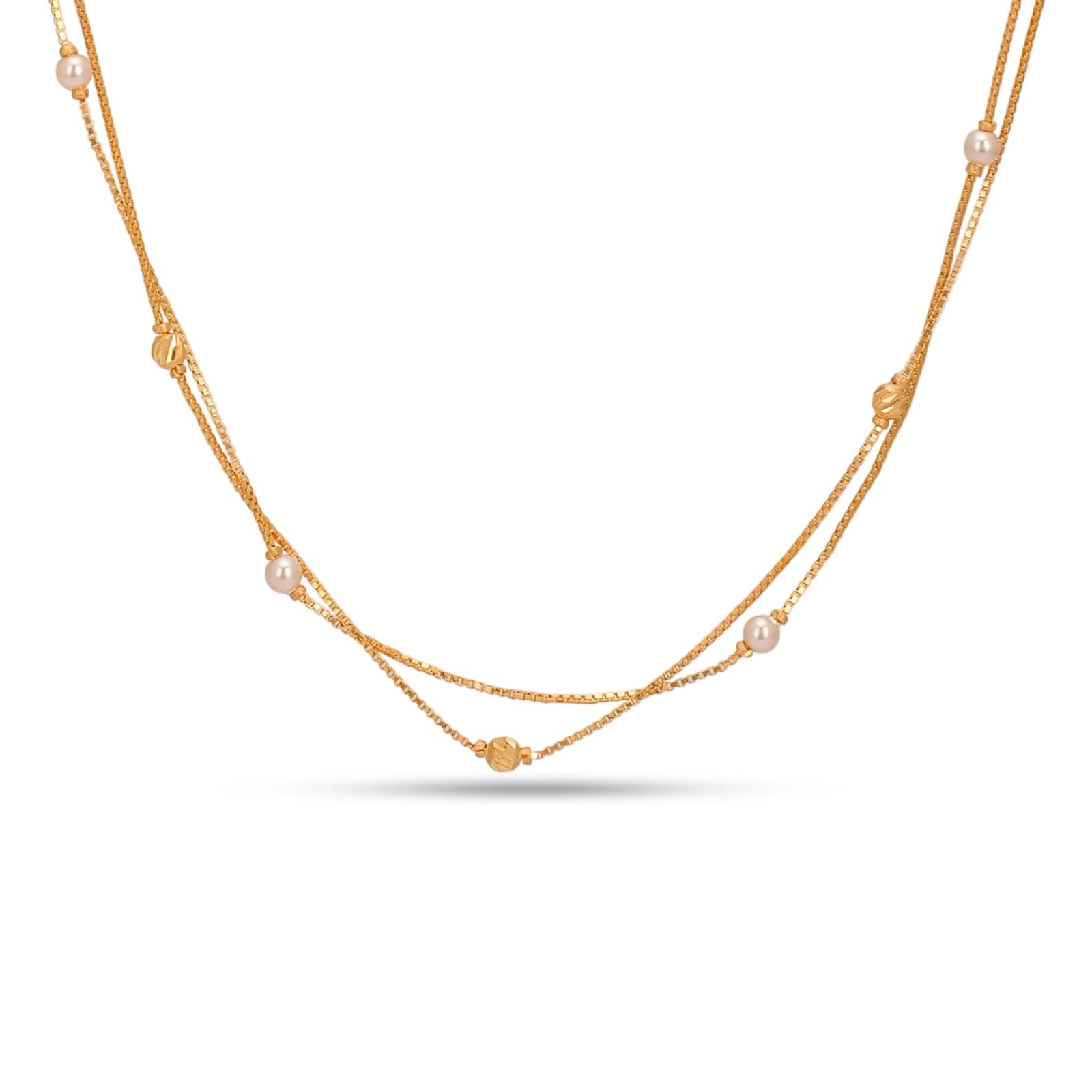 Gold necklace with pearls on a white background
