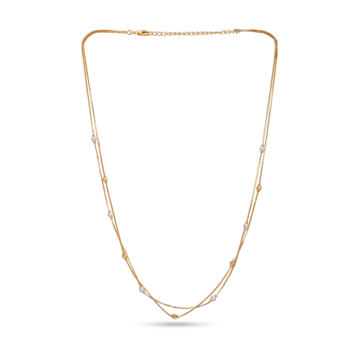 Gold necklace with small pearls on a white background