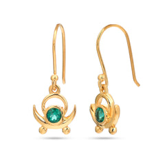 Gold earrings with green gemstones on a white background