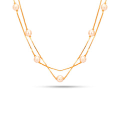 Two-layered pearl necklace with gold chain on a white background