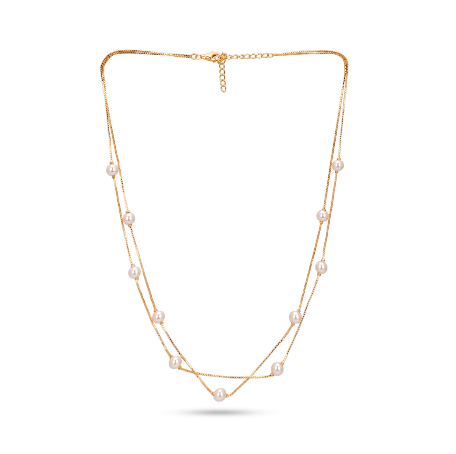 Gold necklace with pearls on a white background