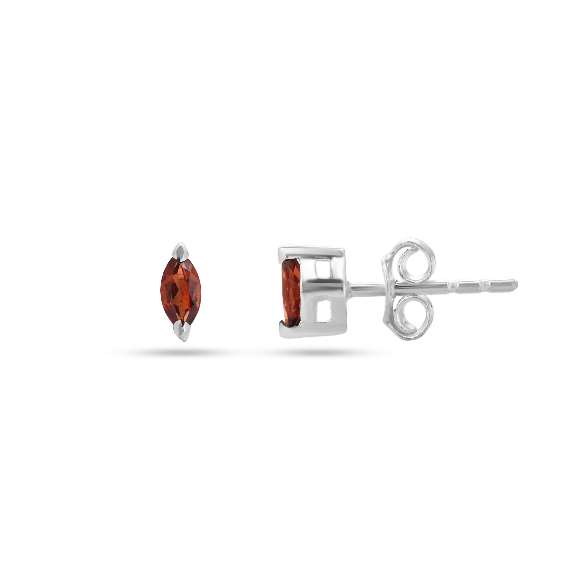 Pair of silver earrings with red gemstones on a white background