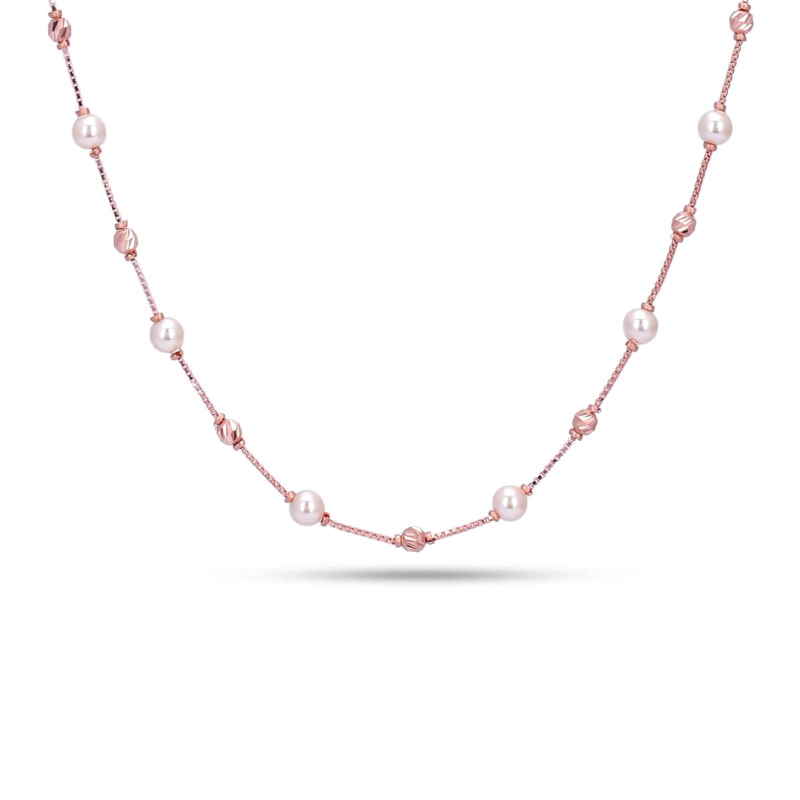 Pearl necklace with pink beads on a white background