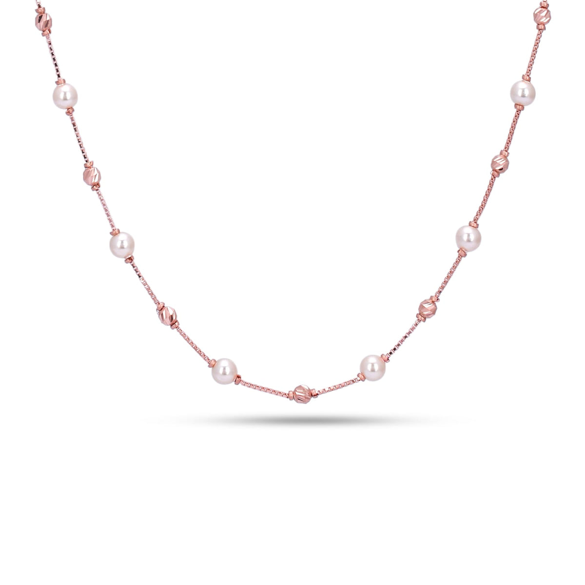 Pearl necklace with pink beads on a white background