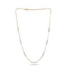 Gold necklace with pearls on a white background