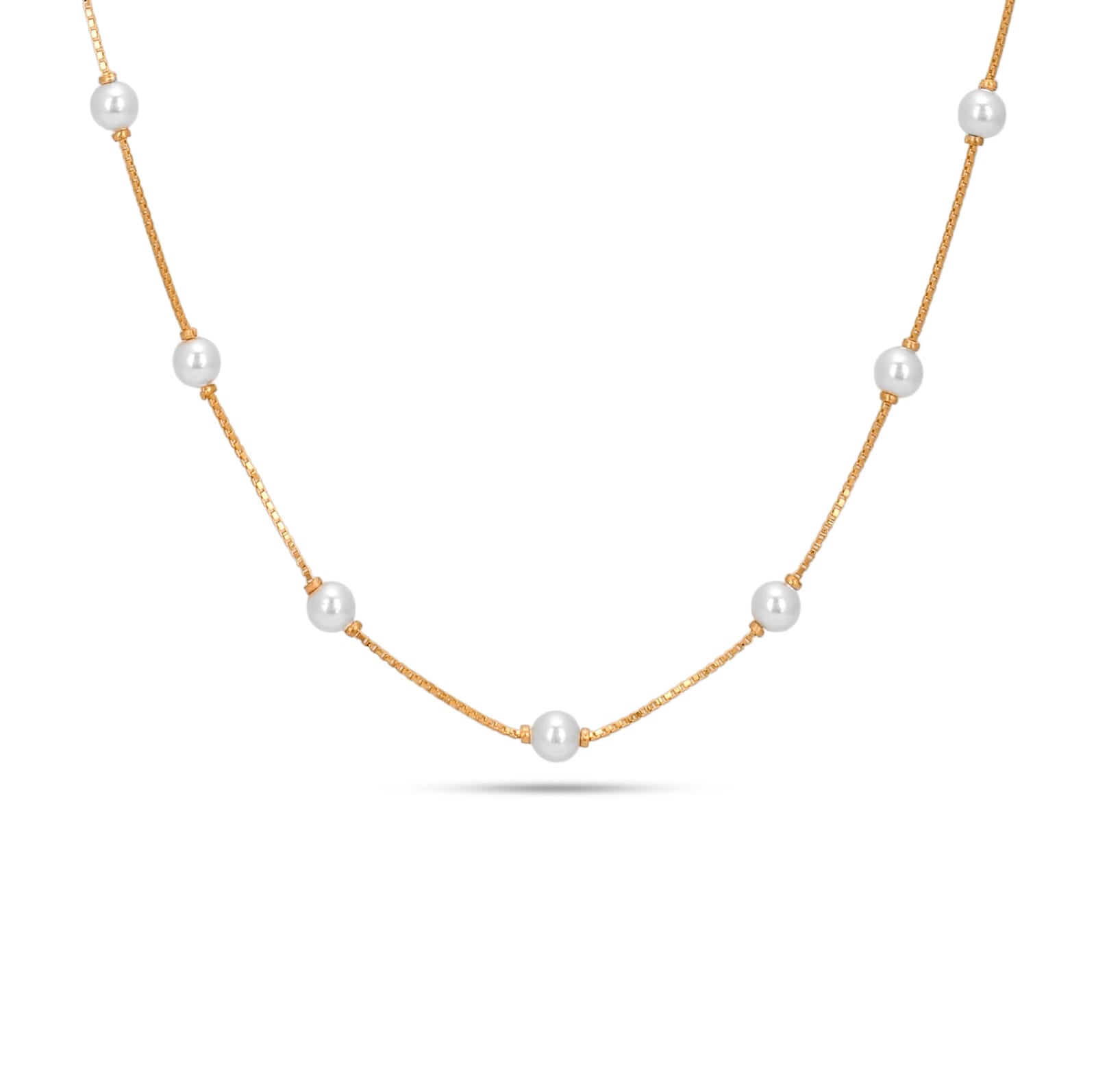 Gold necklace with pearls on a white background