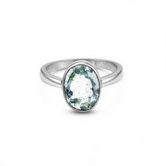 Silver ring with a green gemstone on a white background