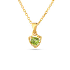 Gold necklace with a green heart-shaped gemstone pendant on a white background