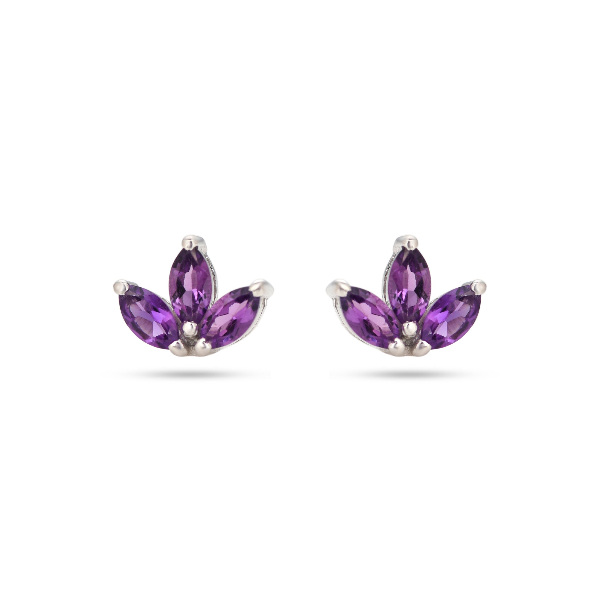 Pair of purple gemstone earrings on a white background